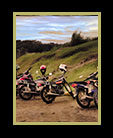 motorcycles lined up at hill thumbnail